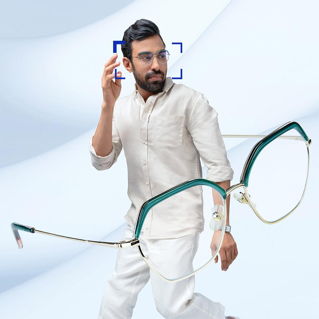 Un homme d&apos;âge moyen portant des verres progressifs ZEISS Light 2.