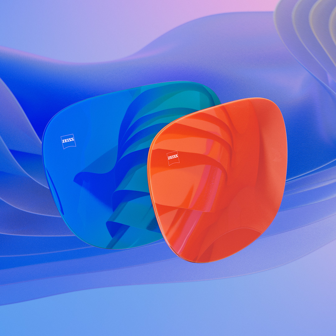 3D-CGI-Illustration von zwei Sonnenbrillengläsern mit blauer und oranger Mirror Beschichtung.
