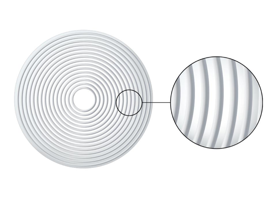 Illustration d&apos;un verre ZEISS MyoCare avec les éléments C.A.R.E. qui créent des zones de défocalisation pour ralentir la progression de la myopie.