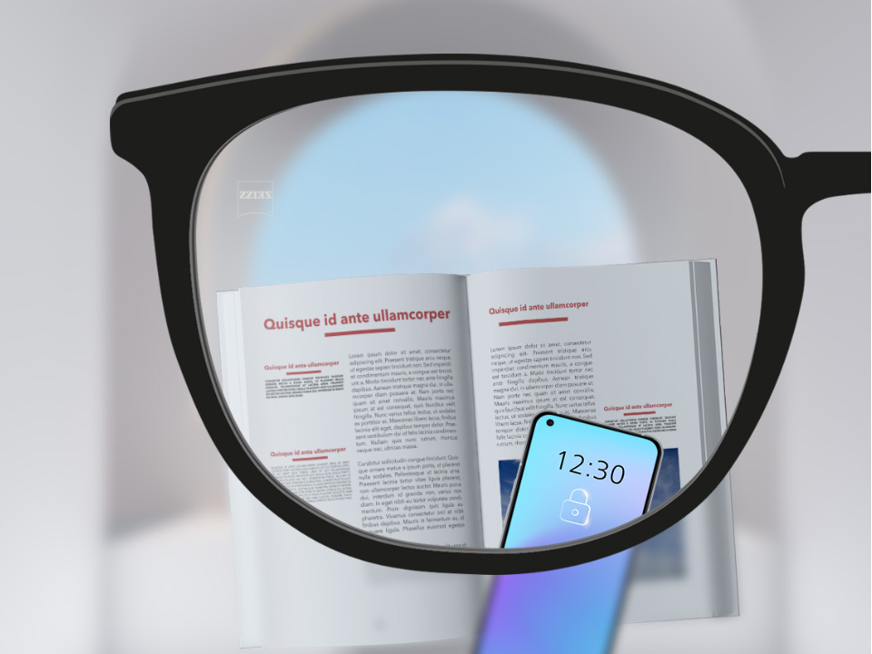 Abbildung mit Blick durch ein ZEISS SmartLife Einstärkenglas. Ein Smartphone und ein Buch sind zu sehen und das Brillenglas ist vollkommen klar.